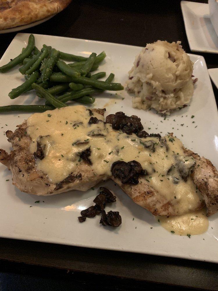 Bella Chicken · 8 oz. wood-fired chicken breast smothered with sauteed baby bellas and topped with our cheese sauce.