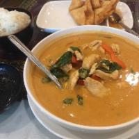 Panang Curry · Your choice of chicken, beef, tofu or shrimp and bell pepper in our creamy coconut panang cu...