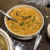 Red Curry · Your choice of meat in coconut red curry sauce with eggplant, bamboo shoots, bell peppers an...