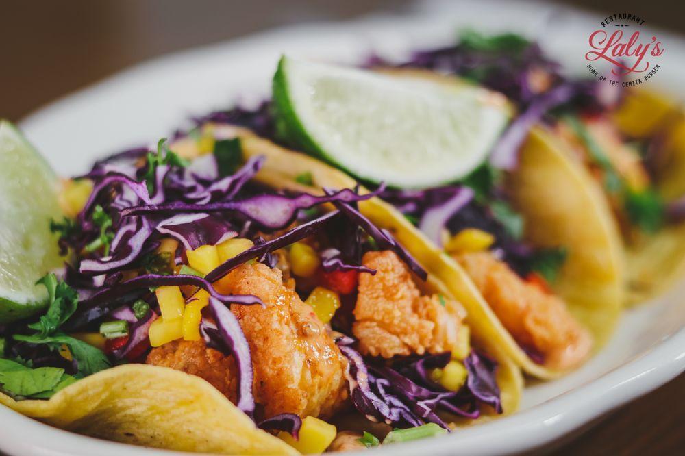 Fish Tacos · Fried cod, chipotle mayo, mango salsa and cabbage.