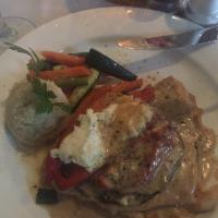 Chicken Ancona · Eggplant, roasted pepper and goat cheese in brandy cognac sauce.