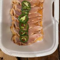 Pepper Fin · Peppred albacore served with jalapeno and sea steak sauce (9 pcs)