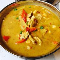 Green Curry · Green curry paste with bamboo shoots, Thai eggplants basil, lime leaves and red bell pepper ...