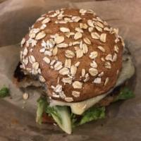 Veggie Burger · Made in house vegan patty served on whole wheat bun. All served on wheat bun with mayo, lett...