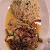 Chicken Napolitana · Grilled and stuffed with ricotta cheese, sun-dried tomatoes, mushrooms, red onions and zucch...