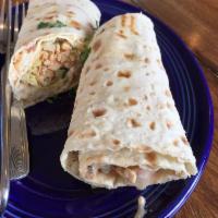 Chicken Hummus Wrap · chopped grilled chicken on lavash with fresh hummus/lettuce/tomato/cucumber seasoned with mi...