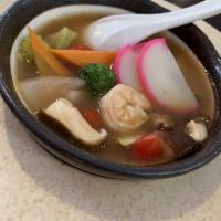 Tom Yum Soup · Shrimp, fish cake and veggies in Thai style.