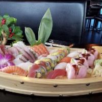 Love Boat · 10 pieces sushi, 18 pieces sashimi with rainbow roll and pink lady roll.