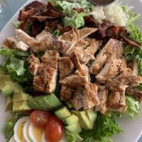 Cobb Salad · Grilled and chilled chicken breast, tomato, Nueske’s bacon, avocado, hard-boiled egg and
cho...