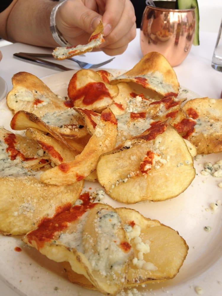 Hell's Fire Chips · Our homemade potato chips, crumbled bleu cheese, and AZ gunslinger hot sauce.