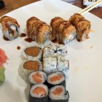 White Tiger Roll · Fried shrimp inside, spicy crab meat on top with eel sauce and spicy mayo.