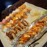 Crunch Roll · Shrimp, crab, cucumber. Top: masago, unagi sauce and tempura flakes.