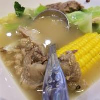 Beef Bulalo Soup · Slowly simmered beef shank with green beans, cabbage, bok choy and corn on the cob.