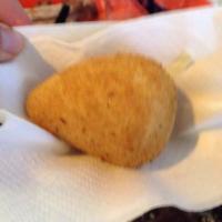 Coxinha ·  a traditional Brazilian appetizer made with wheat dough filled with shredded chicken and de...