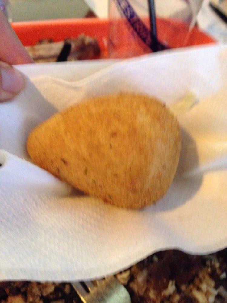 Coxinha ·  a traditional Brazilian appetizer made with wheat dough filled with shredded chicken and deep fried