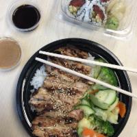 Teriyaki Chicken Bowl · Steamed rice, zucchini, broccoli, carrots, grilled chicken, teriyaki sauce, and sesame seeds.