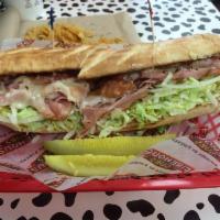 Smoked Turkey Breast Sub · Smoked turkey breast and provolone. Served with mayo, lettuce, tomato, onion, deli mustard, ...