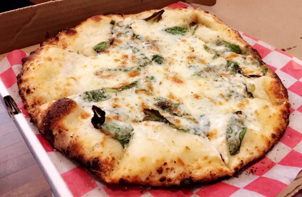 White Pizza · Butter garlic sauce and fresh spinach.