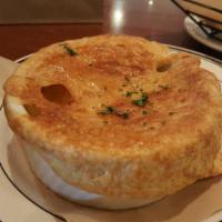 Chicken Pot Pie · Freshly baked with roasted chicken, peas, carrots, onions and potatoes folded into a creamy ...