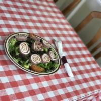 Antipasto Salad · Lettuce, tomatoes, black olives, ham, pepperoni and mozzarella cheese.