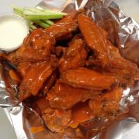 Buffalo Wings · Your choice of mild, hot or honey BBQ sauce. Served with bleu cheese and celery.