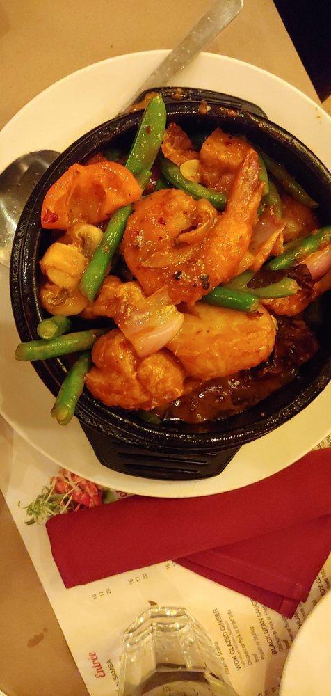 Fire Wok · Prawn, lobster tail, scallop, lemongrass and Thai curry. Spicy.