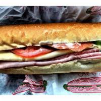 Original American Sub · Ham, hard salami, Swiss cheese, mayonnaise, lettuce, and tomatoes.
