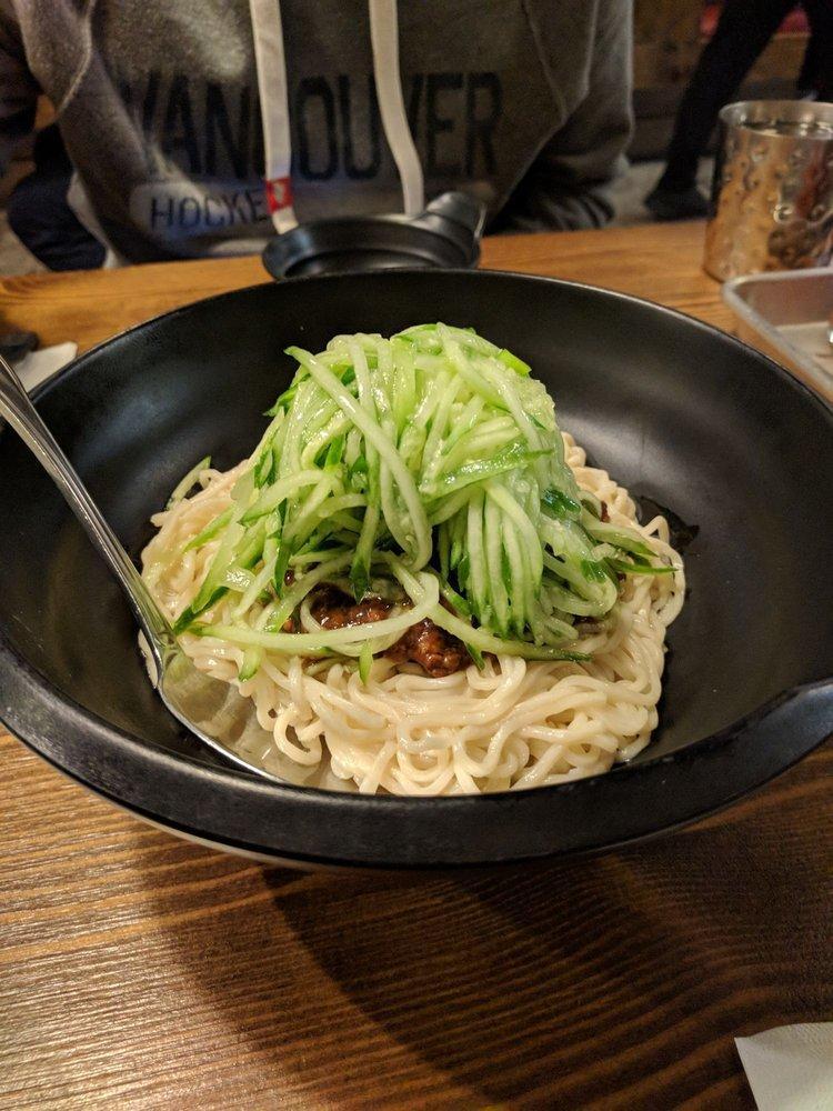 Zha Jiang Noodles · Kurobuta pork, soy bean sauce, cucumber, and cilantro.