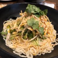 Cold Noodles with Shredded Chicken · Chicken white meat, sesame sauce, cucumber, chili oil, and cilantro. Spicy.