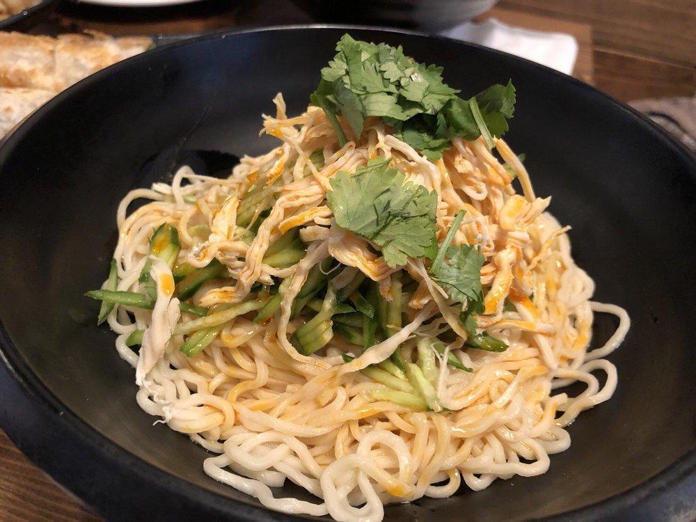 Cold Noodles with Shredded Chicken · Chicken white meat, sesame sauce, cucumber, chili oil, and cilantro. Spicy.