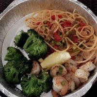 Shrimp Scampi · Shrimp Sauteed in Garlic, Lemon , White Wine and Butter, Served with Spaghetti Marinara and ...