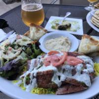 Gyro · Comes with lettuce, onion, tomato, spicy jalapeno sauce and homemade tzatziki. Seafood optio...