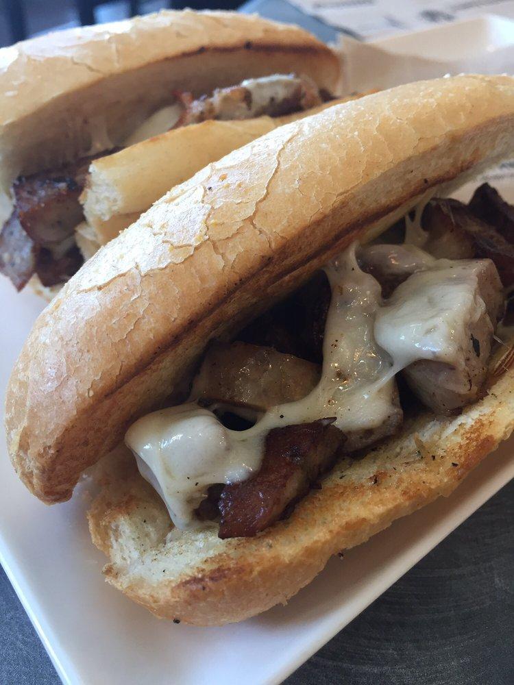 Italian Sausage Sub · If you're thinking about trying our Italian Sausage, do it! We take Italian Sausage and grill it with mushrooms, sweet peppers, onions, melty provolone cheese and top it with marinara. 