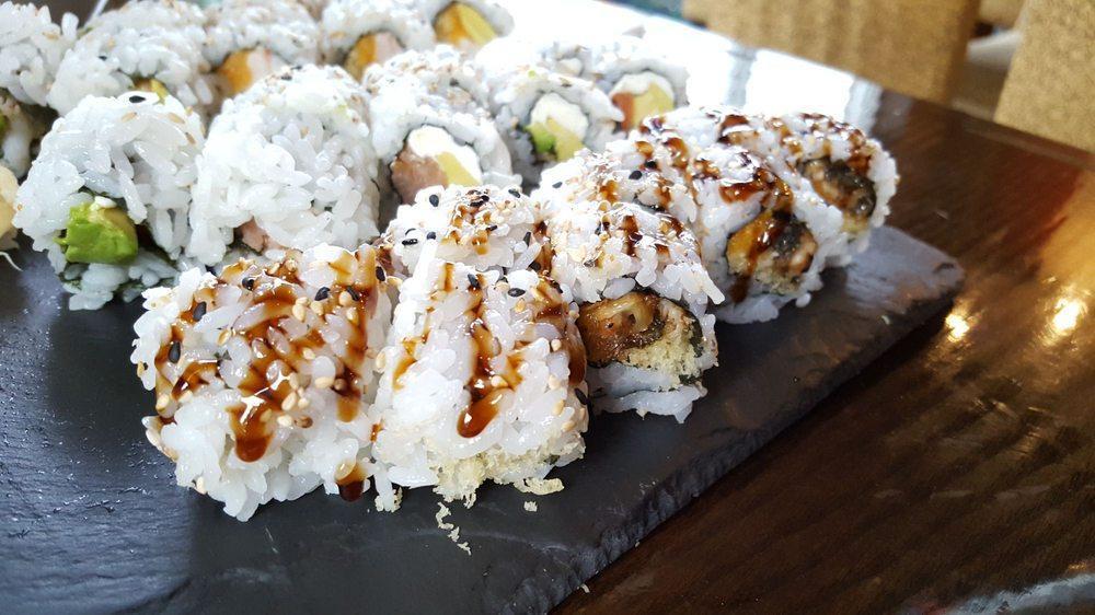 Crunchy Eel Roll · 8 pieces. Eel, tempura crunchy, spicy mayo topped with eel sauce.