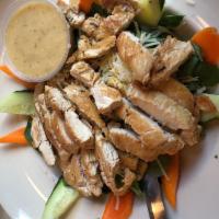 Caesar Salad · Crisp romaine lettuce, grated cheese and croutons. Add grilled chicken for an additional cha...