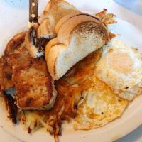 Pork Chops and Eggs Specialty · 2 pork chops, hashbrowns, toast, and 2 eggs.