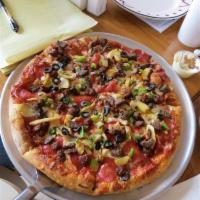 Fusion Pizza · A fusion of pepperoni, meatballs, Italian sausage, Kalamata olives, green peppers, mushrooms...