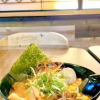 Tonkotsu Ramen · Regular noodle, pork chashu, green onion, kikurage, black mushroom.