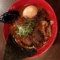 Spicy Miso Ramen · Regular noodle, pork chashu, green onion, corn, miso paste, spisy paste.