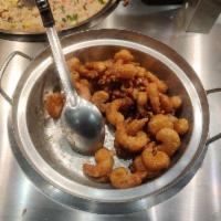 Honey Walnut Shrimp · Large tempura-battered shrimp, wok-tossed in a honey sauce and topped with glazed walnuts.