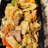 Kee Mao · Drunken noodle. Flat rice noodles sautéed with choice of meat, garlic, onion, bell pepper, h...