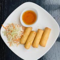 Spring Roll · Crispy fried vegetable rolls filled with cellophane noodles, cabbage and carrots served with...