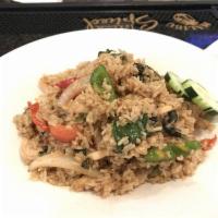 Spicy Basil Fried Rice · Chef’s special fried rice with your choice of meat, onions, tomatoes, bell pepper, basil lea...