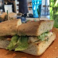 Pesto Sandwich · Served on focaccia bread with fresh pesto, grilled chicken, Swiss cheese, Roma tomatoes and ...