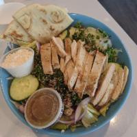 Mediterranean Chicken Salad · Grilled chicken shawarma, tabouli, red onion, roasted red peppers, corn, cucumber and feta. ...