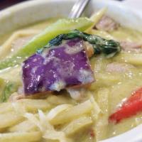 Green Curry · Green coconut milk curry with bell peppers, basil, bamboo shoots and eggplants. Spicy.