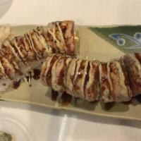 Chicago Fire Roll · Seared tuna salad on top with shrimp tempura, avocado, cream cheese and spicy mayo.