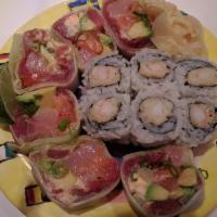Sashimi Roll · Yellowtail, salmon, tuna, avocado, spicy mayo, ponzu sauce and cilantro wrapped with thin cu...