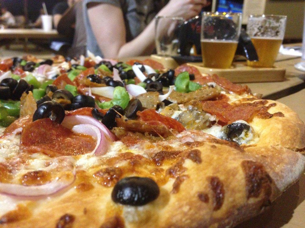 The Supreme Batastrophe Pizza · For the omnivores, our signature cheese blend and red sauce, with sausage, pepperoni, green bell peppers, black olives, mushrooms, and red onions.