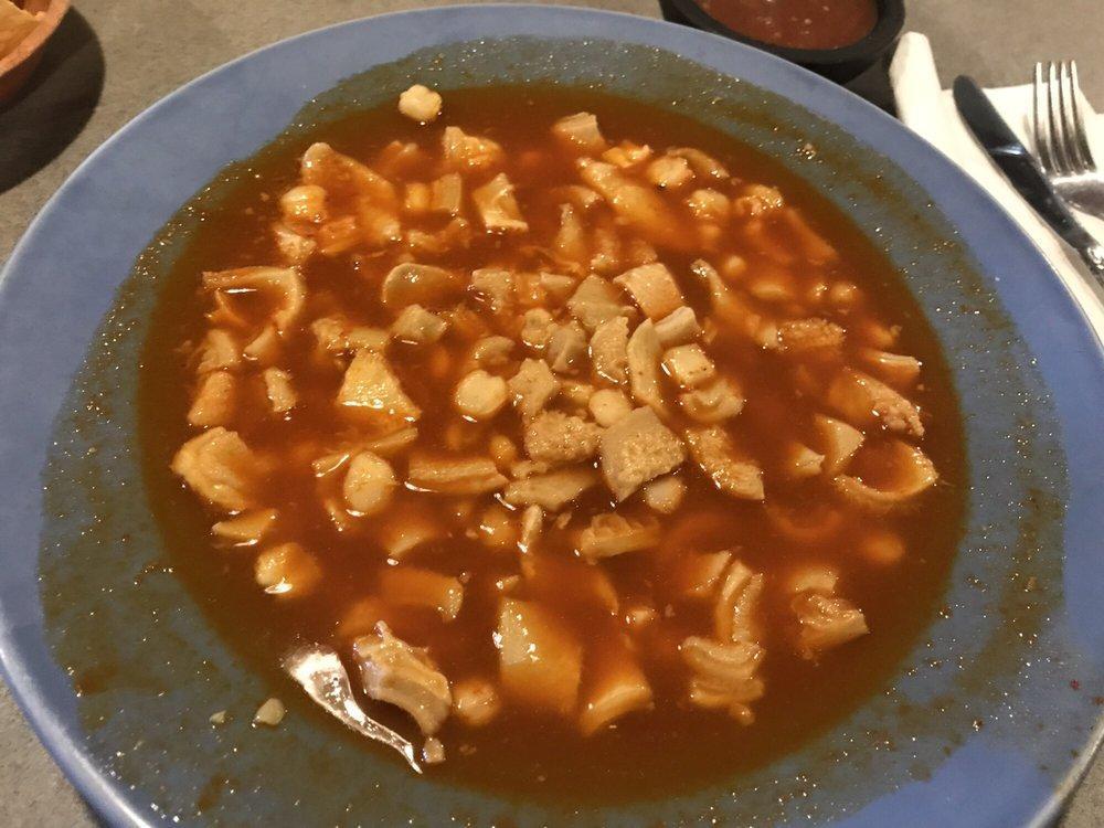 Menudo · Includes hominy and tripe. Comes with onion, cilantro, lemons, chili flakes and oregano on the side. DOES NOT INCLUDE PATA. MUST BE ORDERED ON THE SIDE.